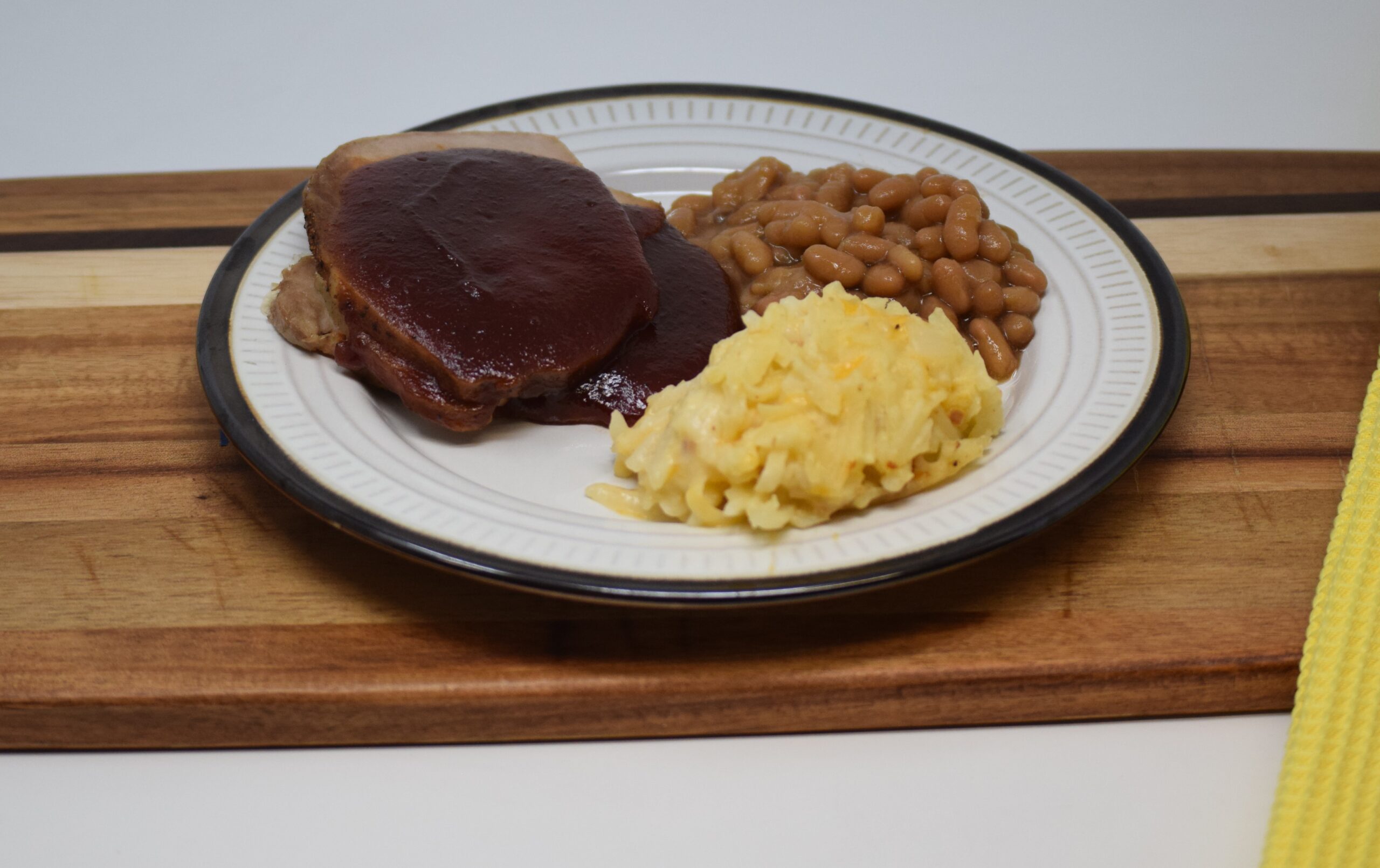 #05 - BBQ Pork Loin, Cheesy Hashbrowns, Baked Beans