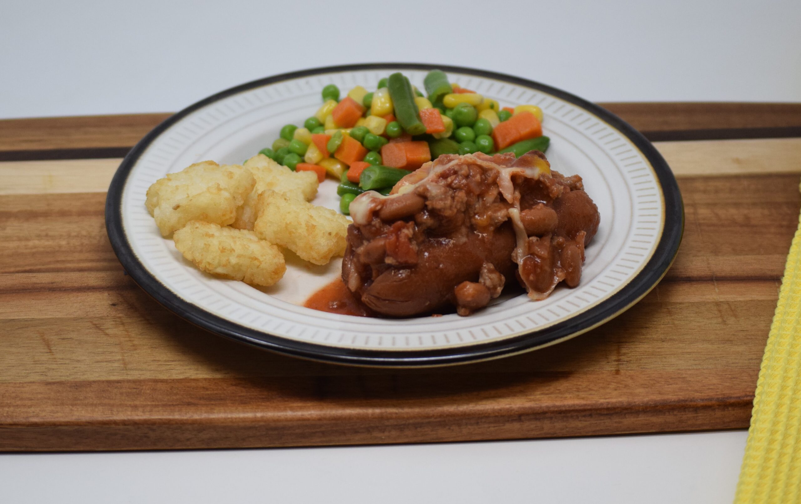 #06 - Chili Cheese Dog, Potato Stars, Mixed Vegetables