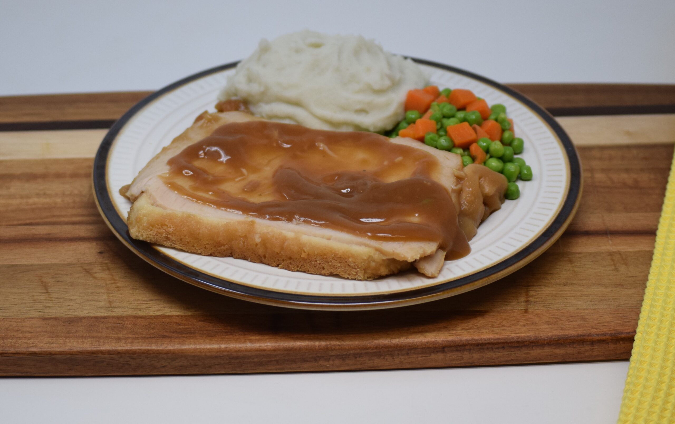 #02 - Hot Turkey Dinner, Mashed Potatoes, Turkey Gravy, Peas & Carrots