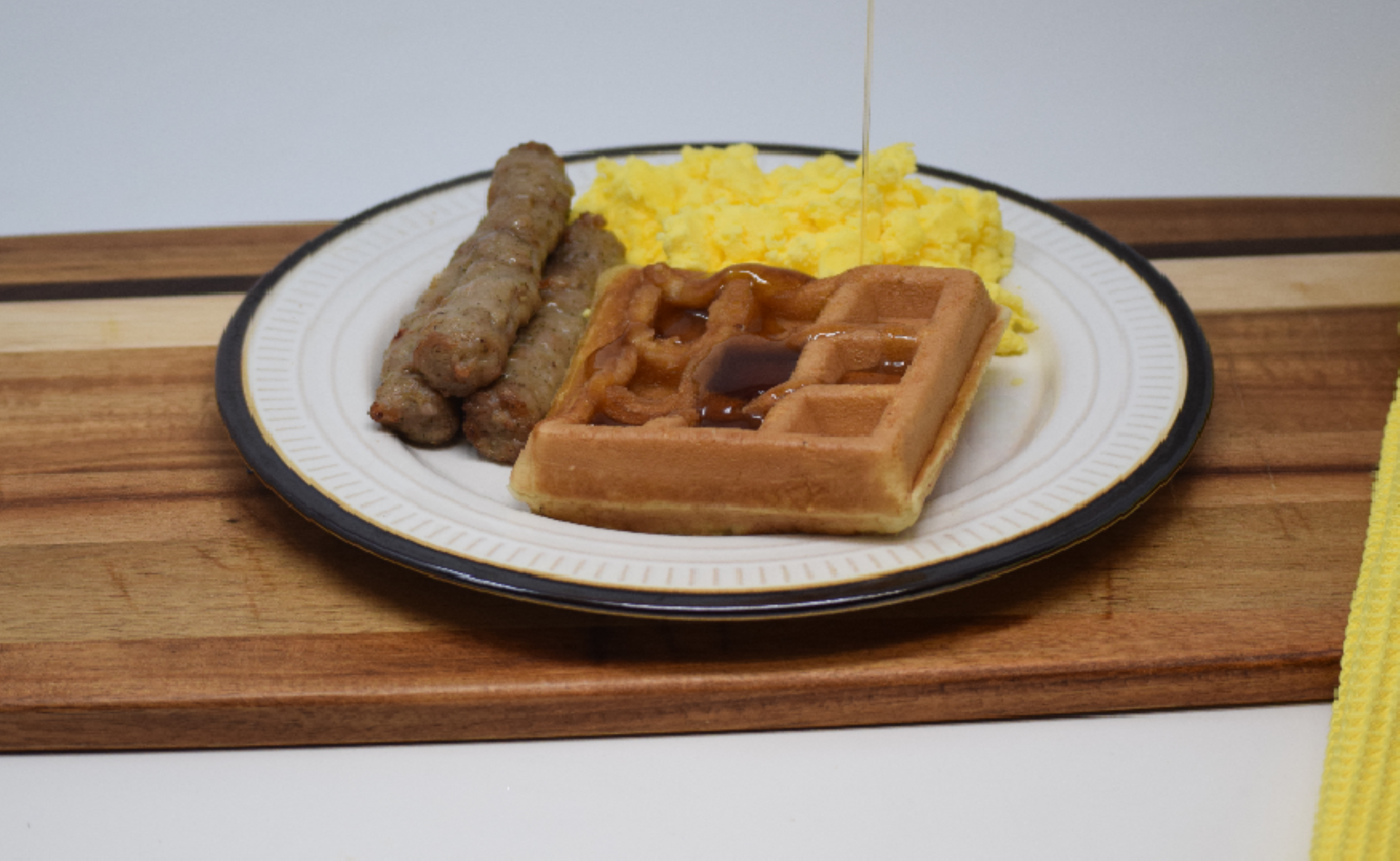 #17 - Belgian Waffle, Scrambled Eggs, Sausage Links, Maple Syrup