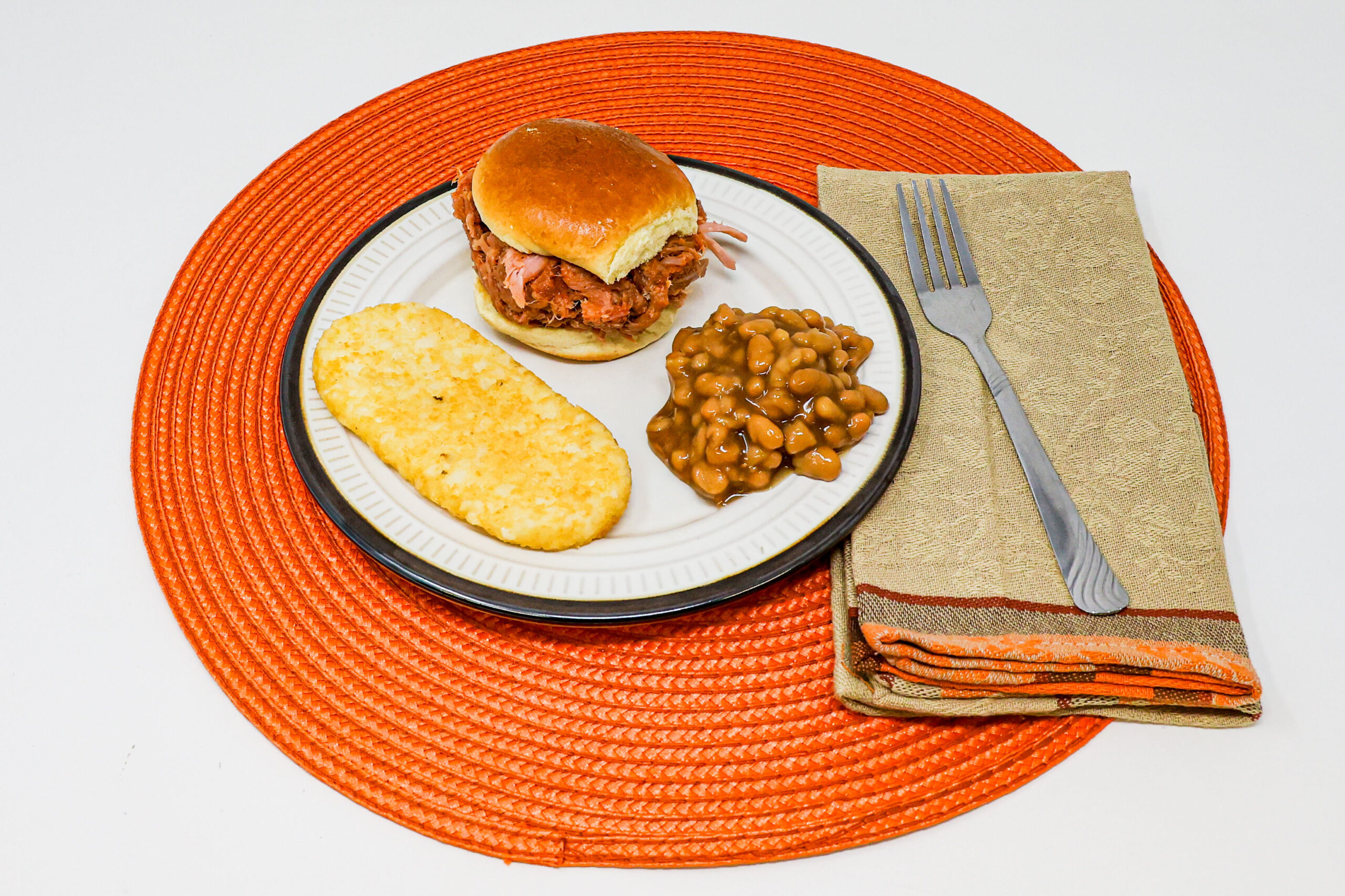 #16 - BBQ Pulled Pork Sandwich, Baked Beans, and Hashbrown