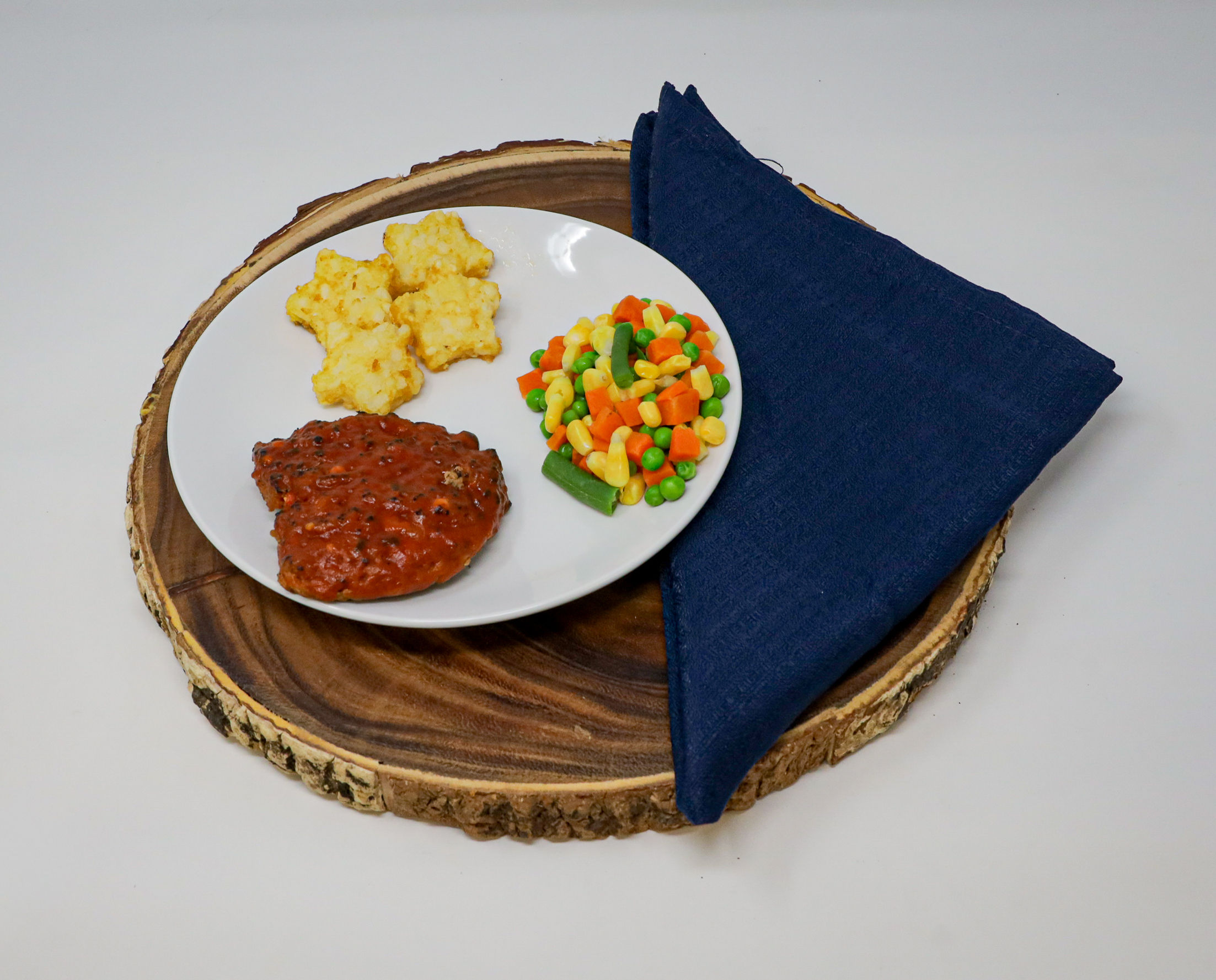 #14 - Meatloaf Patty, Potato Stars, Mixed Vegetables