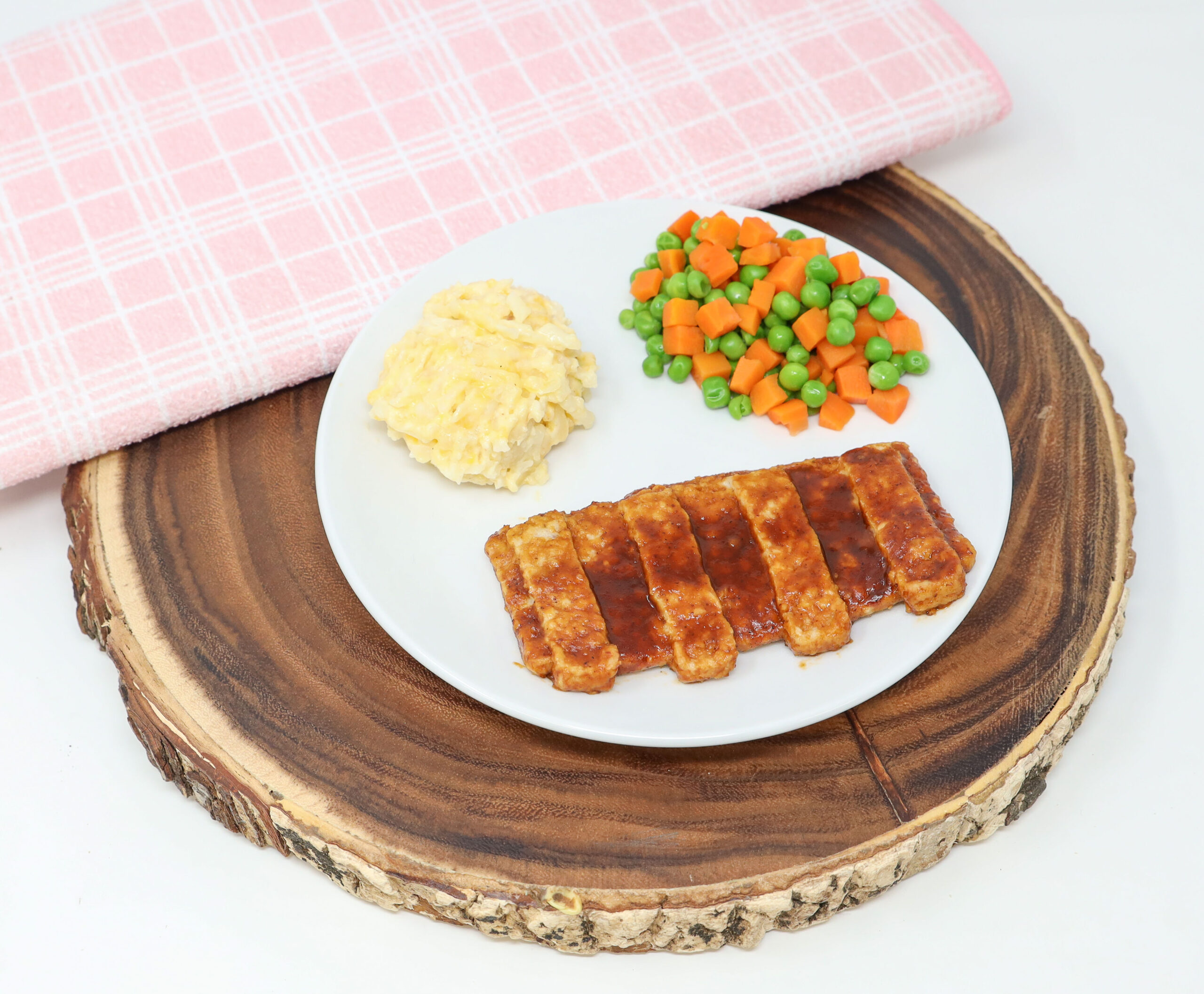 #16 - BBQ Pork Patty, Cheesy Hashbrowns, Peas & Carrots